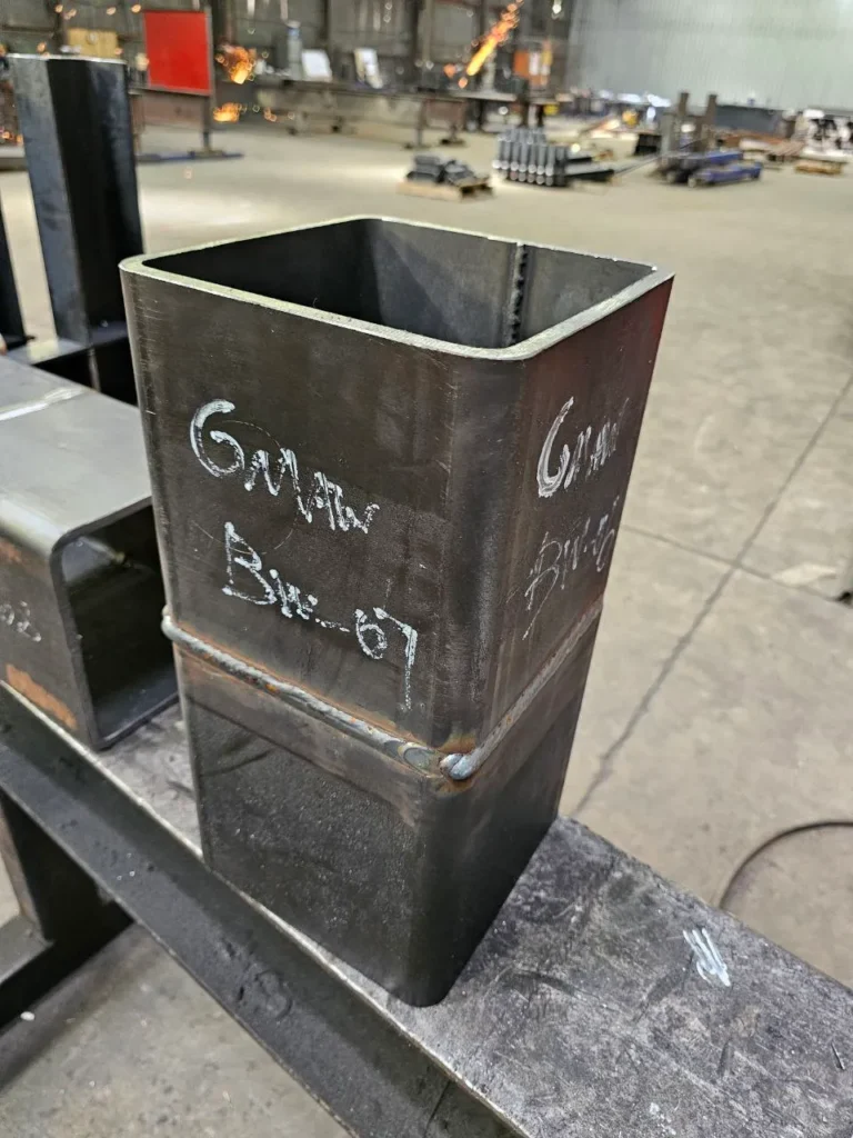 Welded square hollow section test coupons marked for welder qualification testing